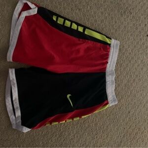 Nike Red and Black Sports Shorts with Yellow Accents